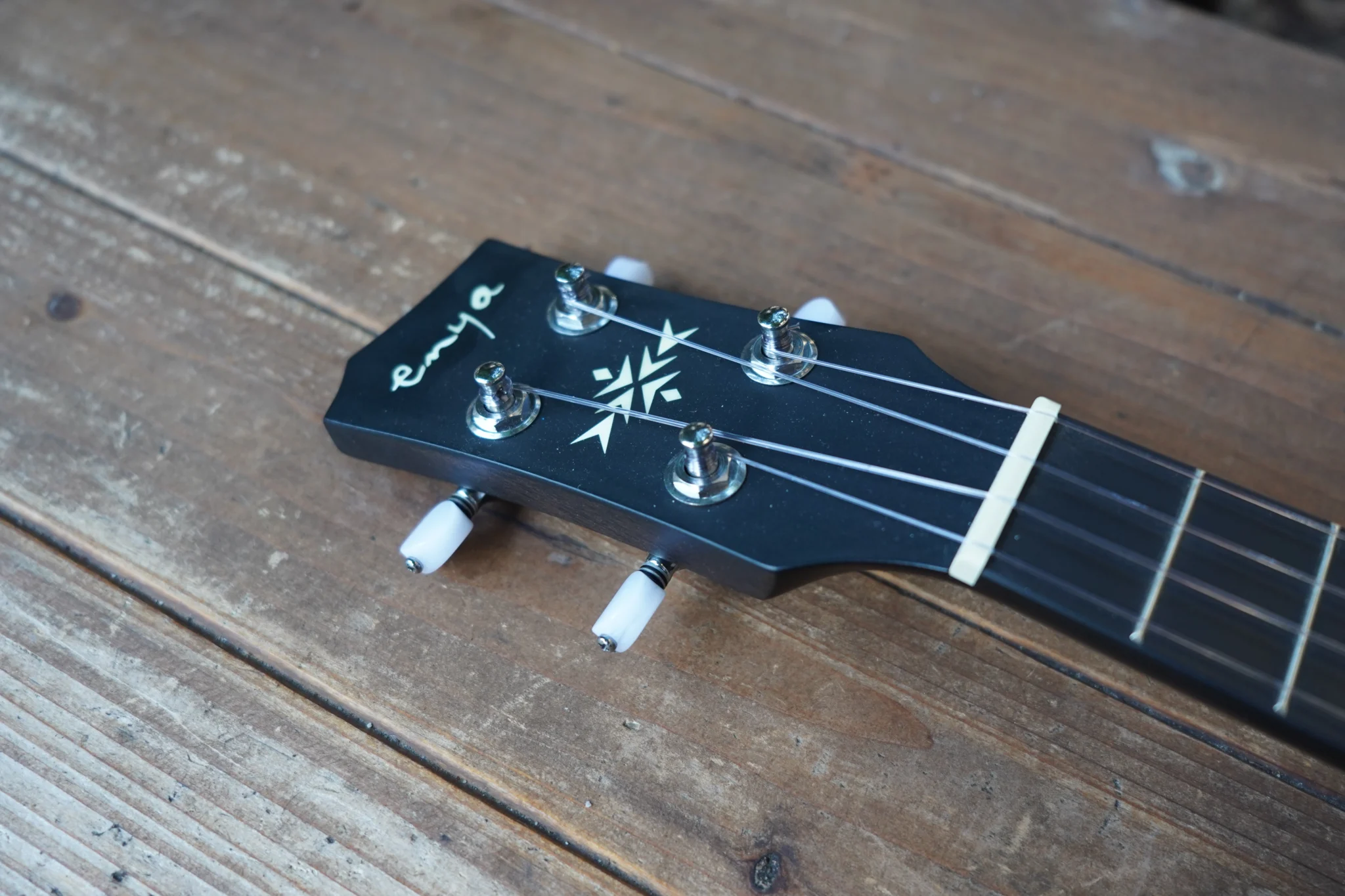 Enya Taimane Moon Ukulele headstock star details